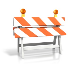 An image of a construction roadblock with lights.