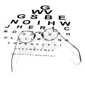a pair of glasses sit on a sight letter chart.