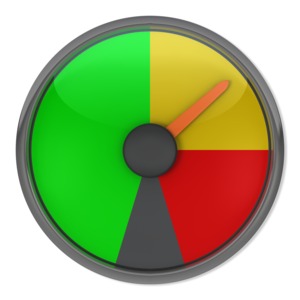 An indicator gauge with it&#039;s needle pointing to the yellow caution area.  Gauges with the needle pointing to green and red are also available.