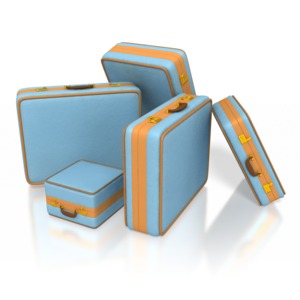 This clip art image shows a pile of different sized suitcases.