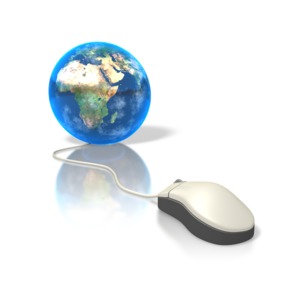 A computer is connected to the earth near the continent of Africa.  A concept of the World Wide Web or the Internet.