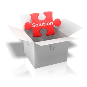 An image of an open box with a puzzle piece and the word Solution written on it.