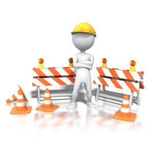 An image of a stick figure standing in a construction site.