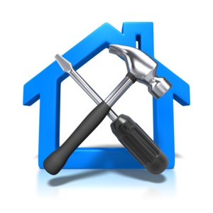An image of an outline of a house behind a hammer and screw driver.