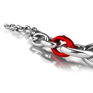 A single chain link is highlighted in red.  A concept of calling attention to one piece of a project or company, or highlighting the item that connects two chains together.  The red link&#039;s color can be changed using our clip art customizer.