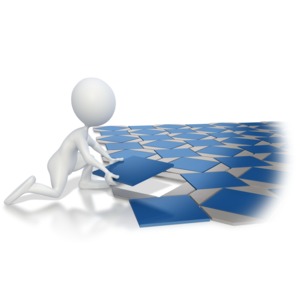 This image shows a stick figure laying the final tile in a pattern.