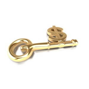 A golden key with a dollar sign.  A concept of the key to wealth, success, investing or retirement.