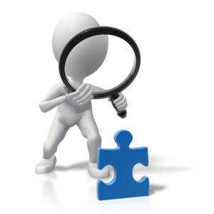 An image of a stick figure looking at a puzzle piece through a magnifying glass.