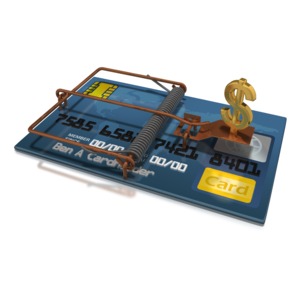 A credit card trap with a gold dollar as the temptation. This clip-art can represent the dangers of credit card debt.