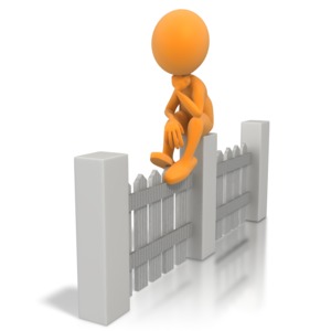 A figure sits on top of a fence in this concept of making a decision or being indecisive or unwilling to take a stand.