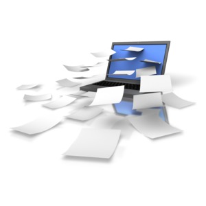 An image with sheets of paper coming out of laptop computer.