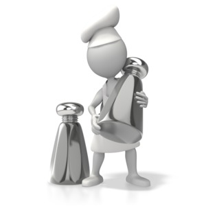 A chef in a hat and apron hold a large salt or pepper shaker in the cooking or restaurant clip art.