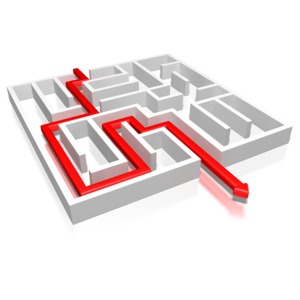 A red arrow successfully winds its way through a maze.