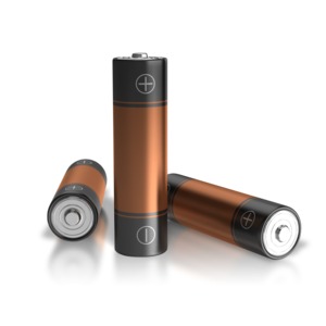 An image of three alkaline batteries with one standing up.