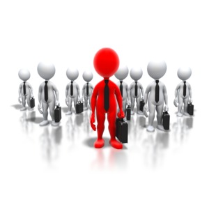 An image of a stick figure leading a group of professionals in business attire.