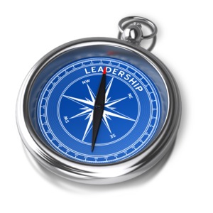 An image of a compass with the word LEADERSHIP on the inside.