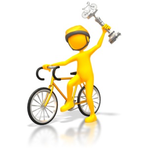 A bike cyclist holds up a silver trophy in victory.