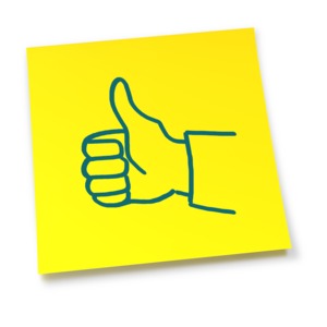 An image of a yellow sticky note with a sketch of a hand giving a thumbs up.