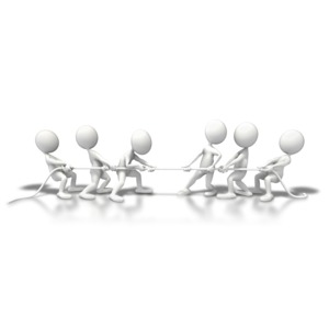 An image of two teams in a tug of war.