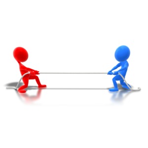 An image of a red stick figure having a tug of war with a blue stick figure.