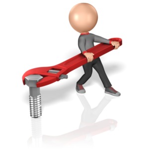 A stick figure uses an adjustable wrench to turn a bolt. This clip-art can represent using the right tool for the right job.