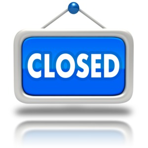 An image of a hanging sign that says &quot;closed&quot;