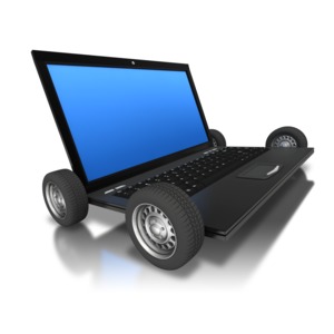 An image of a computer / laptop on wheels.