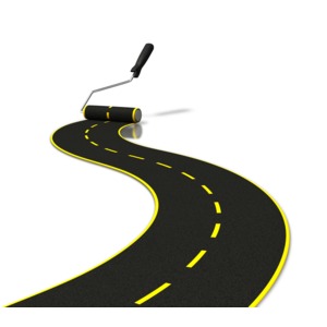 An image of a road being created by a paint roller.