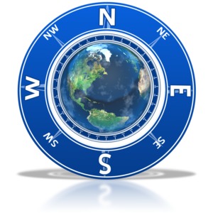 A clip art image of the world inside of a circular compass.