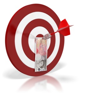 This clip art image shows a British pound bill pinned to the middle of a target by a dart.  This graphic displays a concept of financial success.