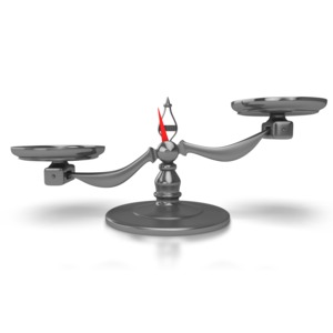 A scale is tipped to the left indicating something has more weight or value.  Add you own items to the scale in PowerPoint to indicate items that are unequal our out of balance.