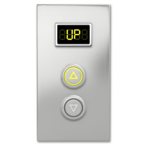 An image of an elevator button panel with a button illuminated and text description up.