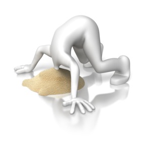 A stick figure buries its head in a pile of sand.