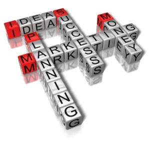 A crossword of letter blocks spells out important business terms.