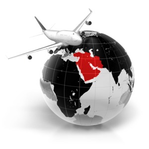 An image of a commercial airline flying over the world with the Middle East highlighted.