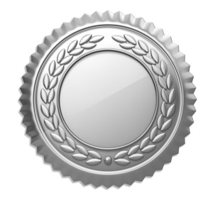 A simple shiny silver seal or metal.  Center is bank to allow space for text or other design element.