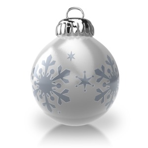 A single silver Christmas ornament with a snowflake pattern.