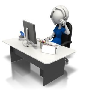 An image of a secretary sitting at a desk.