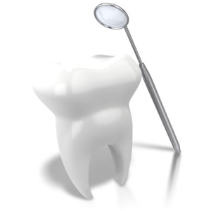 An image of a tooth being inspected by a dentist&#039;s mirror.