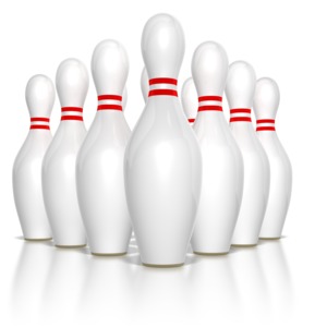 Ten bowling pins set up and ready for the next throw.