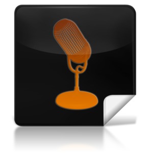 This clip art image shows a black icon with a microphone on it.