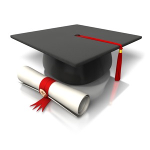 An image of a diploma and a graduation hat together.