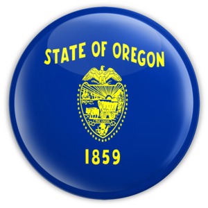 An image of Oregon&#039;s flag on a badge.