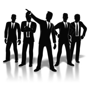 A group of silhouette style businessmen pose as a group. This clip-art can represent a business team.