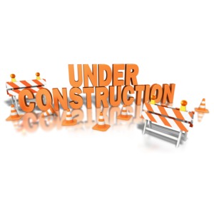 An image of the word &quot;under construction&quot; with cones and barricades.