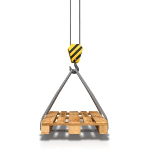 An image of a crane hook and steel cable carrying an empty pallet.