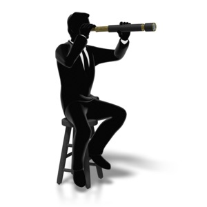 An image of a business man looking through a spyglass looking out.