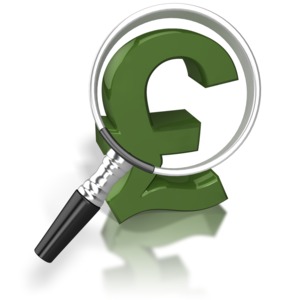 A magnifying glass in front of a pound.