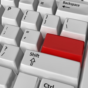 A blank red key on a keyboard.