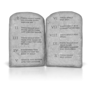 This clip art image shows two stones with the ten commandments written on them.